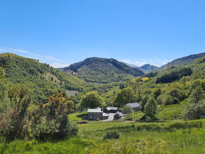 Gelli Newydd from across the Conwy Valley — the estate in the Snowdonia landscape