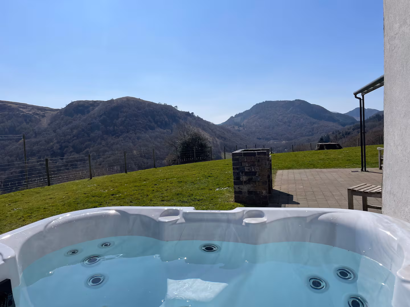 Hot tub on the front patio at The Farmhouse, looking down the Conwy Valley